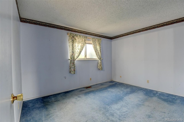 9766 Fillmore St, Thornton, CO 80229 - carpeted empty room featuring a textured ceiling and ornamental molding