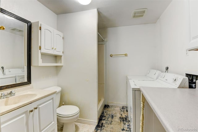 9766 Fillmore St, Thornton, CO 80229 - full bathroom featuring washer and dryer, vanity, and  shower combination