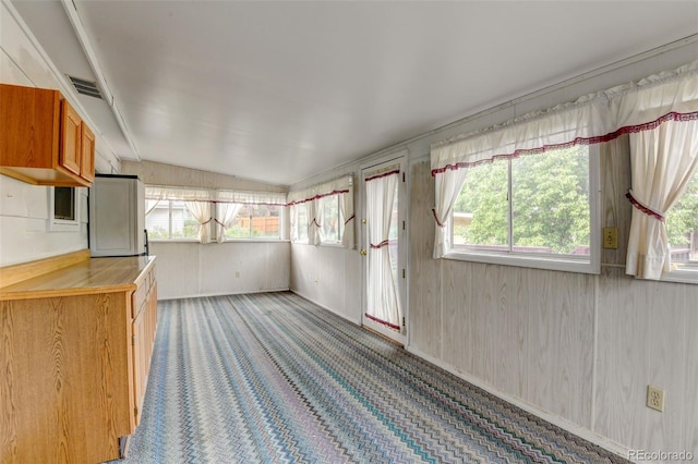 9766 Fillmore St, Thornton, CO 80229 - unfurnished sunroom featuring healthy amount of natural light and lofted ceiling