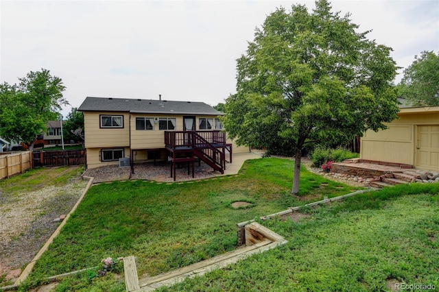 9766 Fillmore St, Thornton, CO 80229 - back of house featuring stairs and a wooden deck