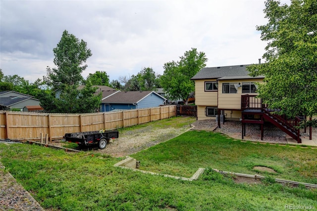 9766 Fillmore St, Thornton, CO 80229 - fenced backyard with stairs and a deck