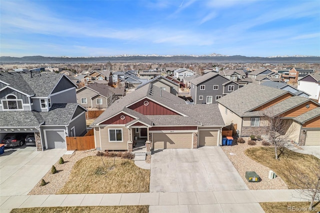6817 Sequoia St, Frederick, CO 80530 - view of front facade with a residential view, fence, a garage, board and batten siding, and concrete driveway