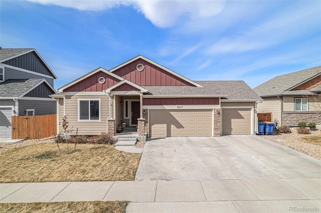 6817 Sequoia St, Frederick, CO 80530 - craftsman-style house featuring board and batten siding, fence, concrete driveway, an attached garage, and a shingled roof