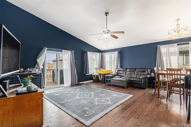 6817 Sequoia St, Frederick, CO 80530 - living area with vaulted ceiling, wood finished floors, and ceiling fan with notable chandelier