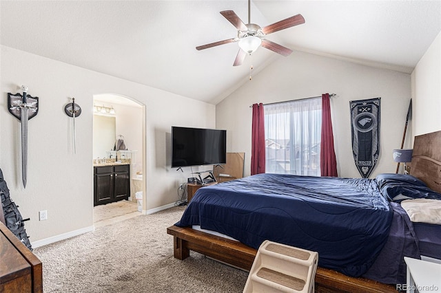 6817 Sequoia St, Frederick, CO 80530 - bedroom with a ceiling fan, vaulted ceiling, baseboards, connected bathroom, and light carpet