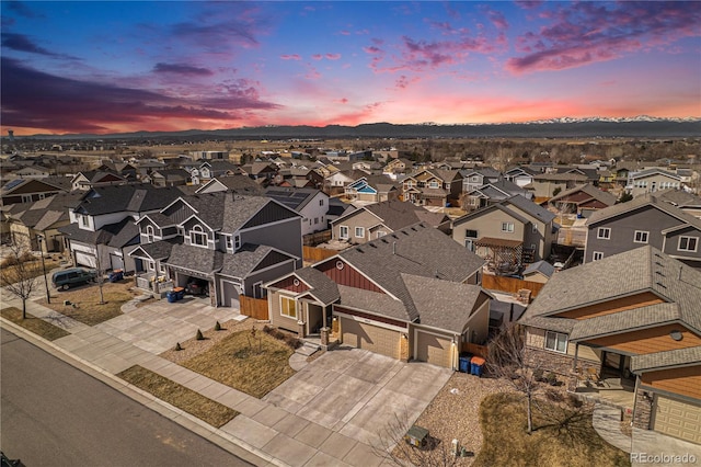 6817 Sequoia St, Frederick, CO 80530 - aerial view at dusk featuring a mountain view and a residential view