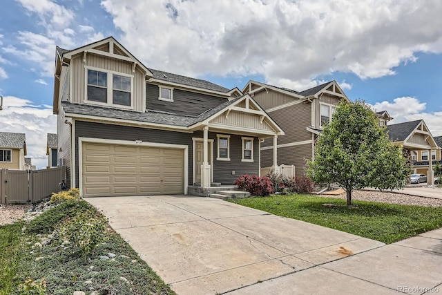 4414 Walden St, Denver, CO 80249 - craftsman-style house featuring board and batten siding, driveway, and an attached garage