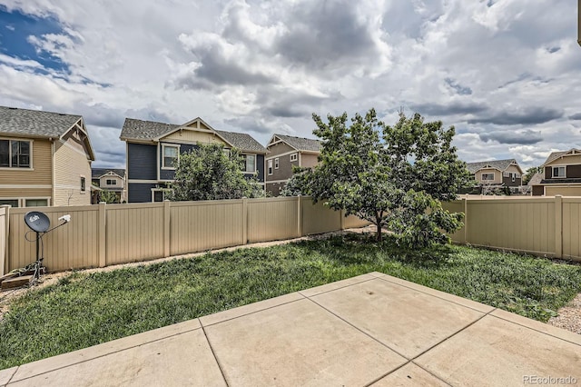 4414 Walden St, Denver, CO 80249 - fenced backyard with a residential view and a patio