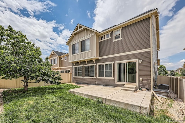 4414 Walden St, Denver, CO 80249 - rear view of property with a fenced backyard, a patio, and entry steps
