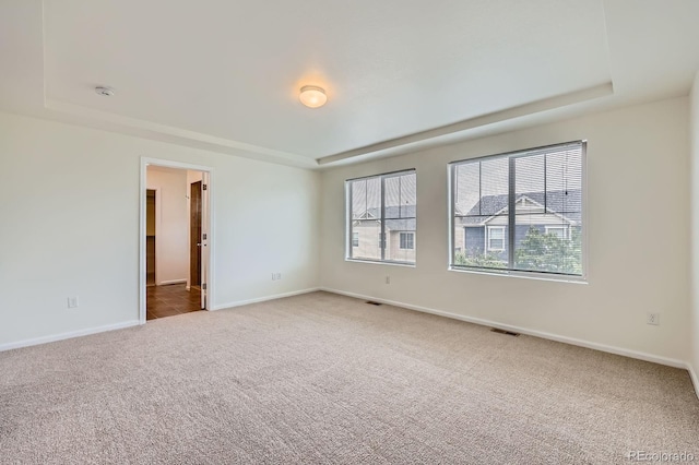 4414 Walden St, Denver, CO 80249 - empty room featuring carpet, a smoke detector, and a raised ceiling