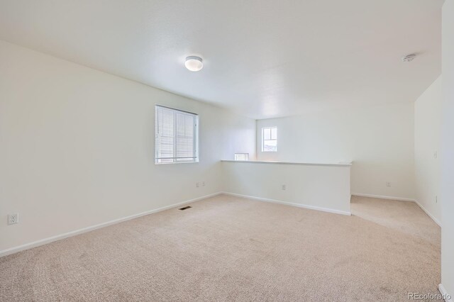 4414 Walden St, Denver, CO 80249 - spare room with light colored carpet and a smoke detector