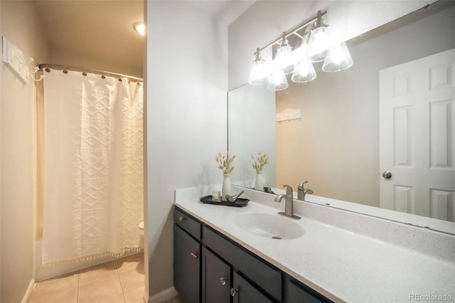 404 Raspberry Ln, Monument, CO 80132 - bathroom featuring vanity, tile patterned floors, curtained shower, toilet, and baseboards