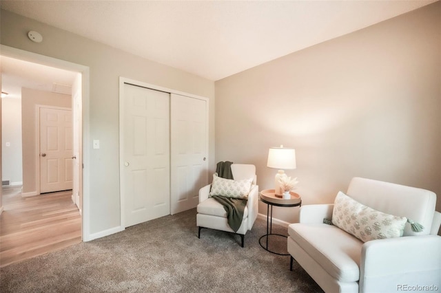 404 Raspberry Ln, Monument, CO 80132 - living area featuring baseboards and light carpet