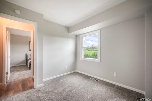 404 Raspberry Ln, Monument, CO 80132 - unfurnished bedroom with carpet flooring and baseboards