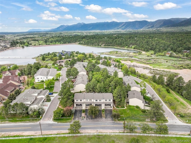 404 Raspberry Ln, Monument, CO 80132 - aerial perspective of suburban area with a water and mountain view and a heavily wooded area