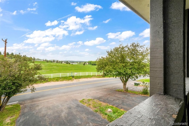 404 Raspberry Ln, Monument, CO 80132 - view of asphalt road featuring a rural view