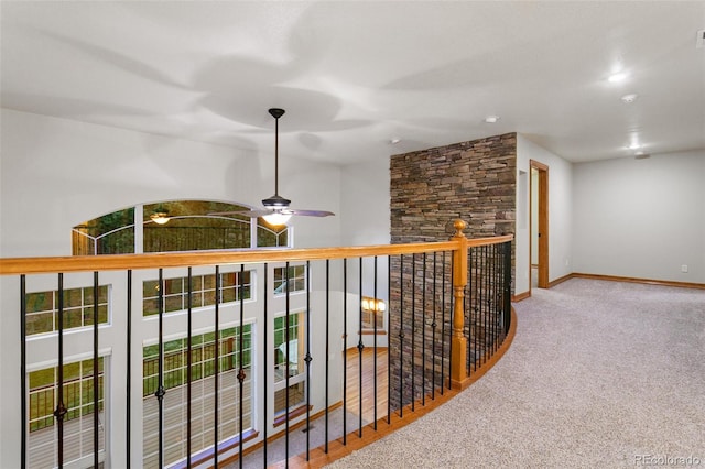 hallway featuring carpet floors