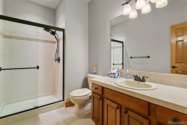 bathroom with walk in shower, tile flooring, toilet, and vanity