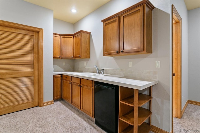 kitchen with light carpet, sink, and dishwasher