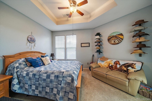 12856 King St, Broomfield, CO 80020 - carpeted bedroom featuring a raised ceiling, ornamental molding, and a ceiling fan