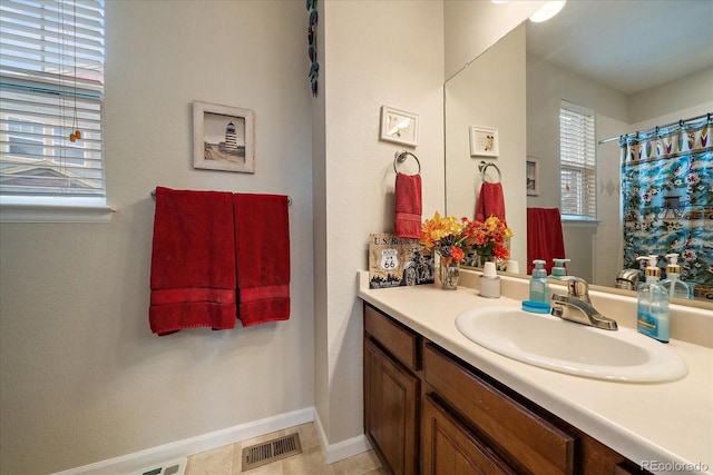 12856 King St, Broomfield, CO 80020 - full bathroom featuring vanity and a shower with curtain