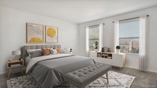 bedroom with light carpet, multiple windows, and baseboards