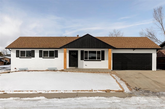 single story home with a garage