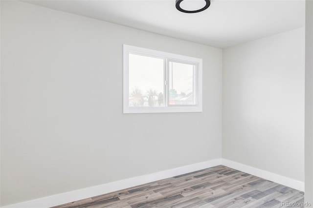 unfurnished room featuring light hardwood / wood-style flooring