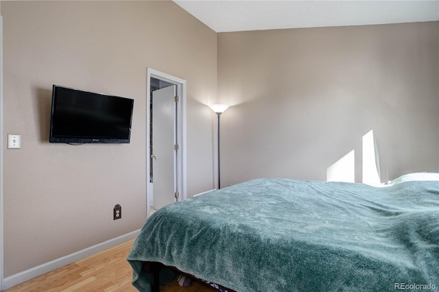 bedroom featuring hardwood / wood-style flooring