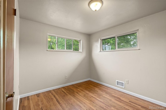 6627 Eaton St, Arvada, CO 80003 - spare room with baseboards and wood finished floors