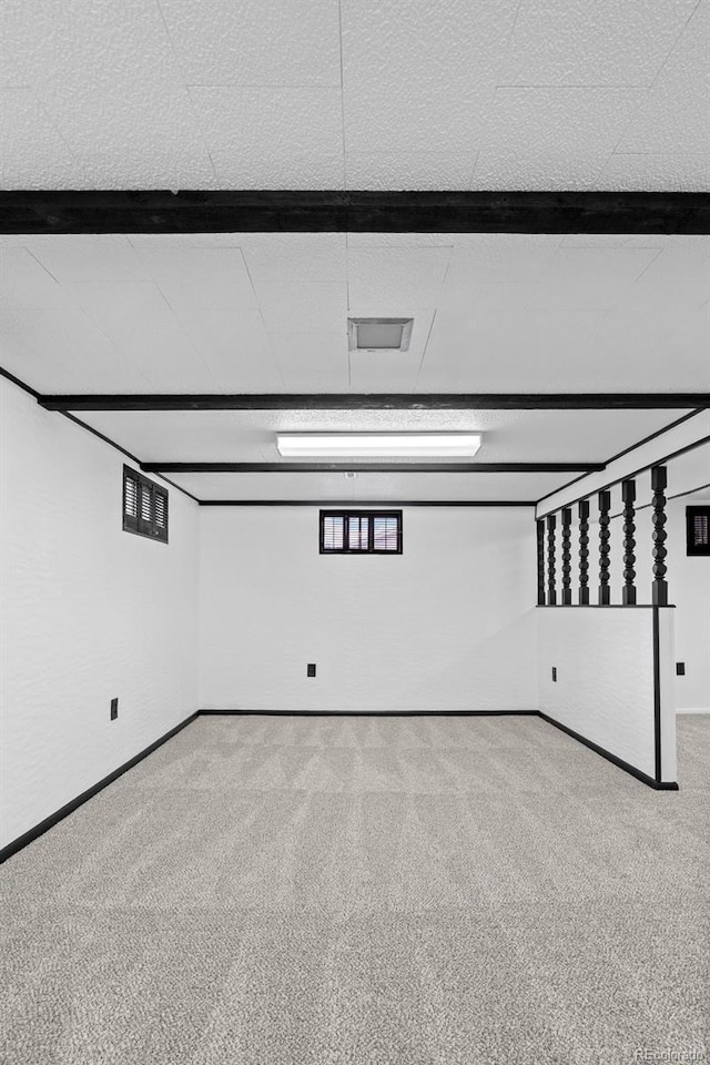6627 Eaton St, Arvada, CO 80003 - basement with carpet flooring and baseboards
