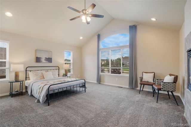 bedroom with carpet floors, ceiling fan, and lofted ceiling