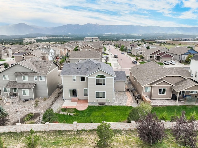 drone / aerial view featuring a mountain view