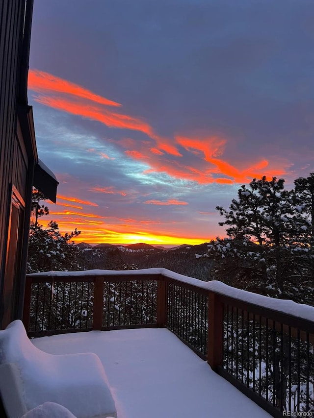 view of snow covered deck