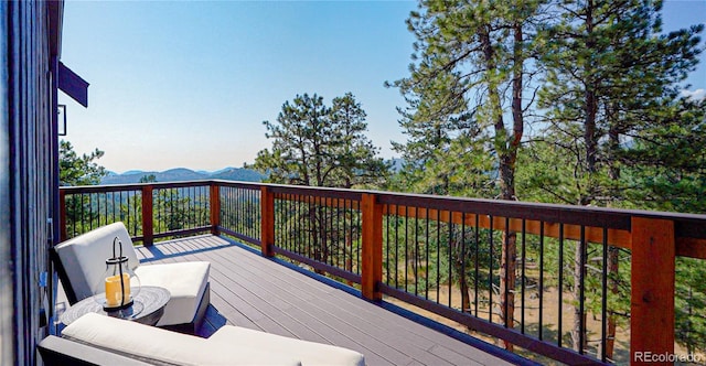 deck with a mountain view