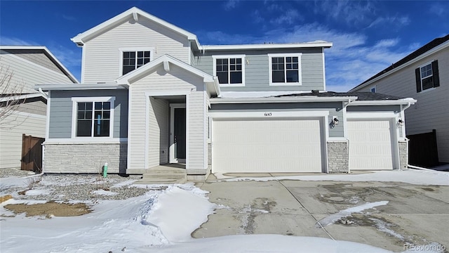 view of front of home with a garage