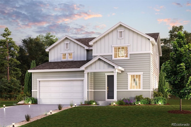 view of front of house with an attached garage, concrete driveway, roof with shingles, a front lawn, and board and batten siding