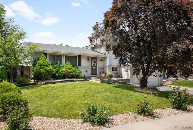 7371 Otis Ct, Arvada, CO 80003 - split level home featuring a garage