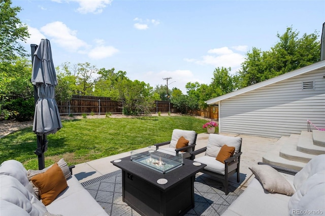 7371 Otis Ct, Arvada, CO 80003 - view of patio / terrace featuring an outdoor living space with a fire pit