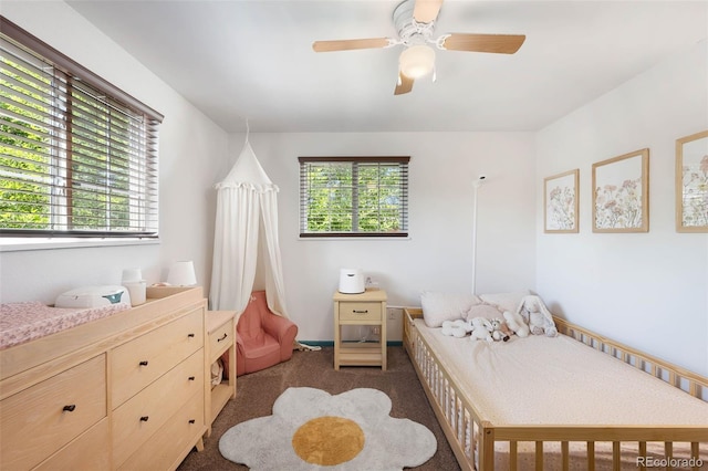 7371 Otis Ct, Arvada, CO 80003 - carpeted bedroom with a ceiling fan