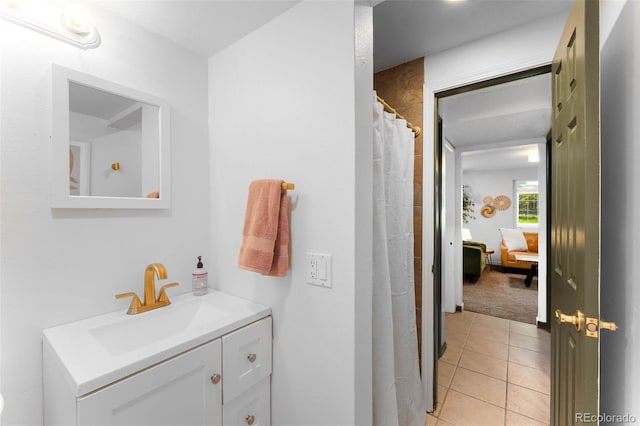 7371 Otis Ct, Arvada, CO 80003 - bathroom with vanity and tile patterned flooring