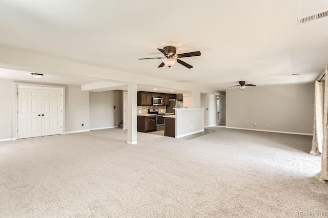 1905 Graphite Ct, Castle Rock, CO 80108 - unfurnished living room featuring ceiling fan and light carpet