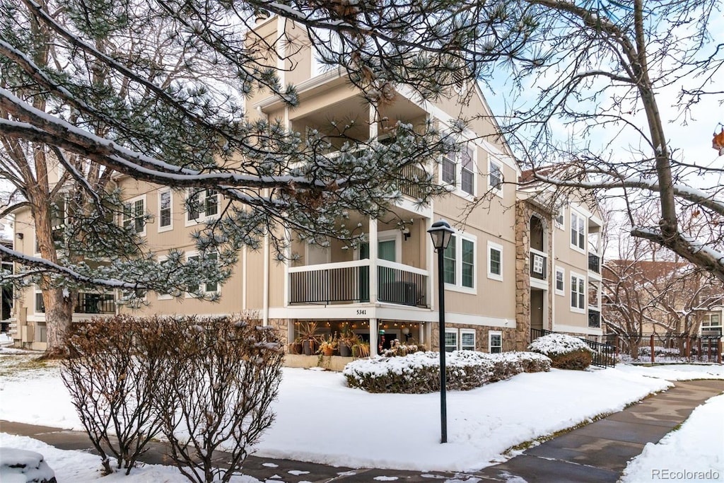 view of snow covered property