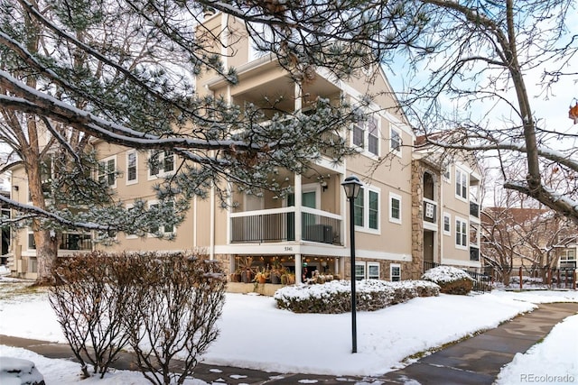 view of snow covered property