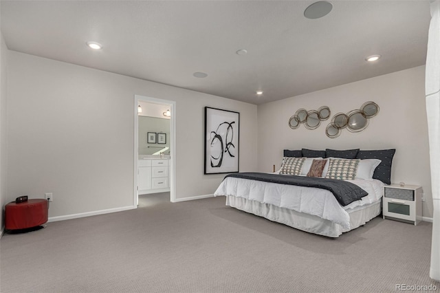 bedroom with carpet flooring and ensuite bathroom