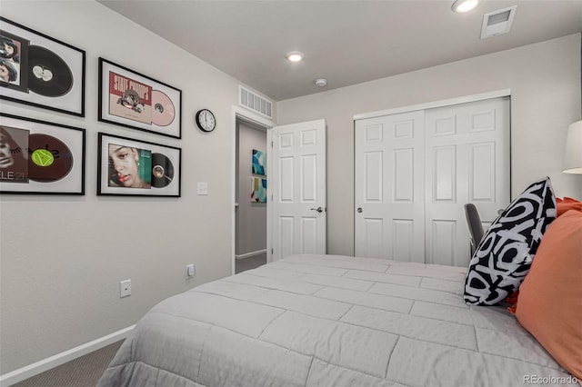 carpeted bedroom featuring a closet