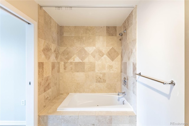 full bathroom featuring tiled shower / bath