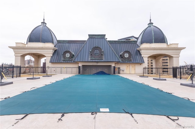 view of pool with fence