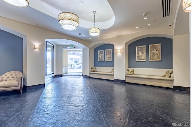 building lobby featuring visible vents