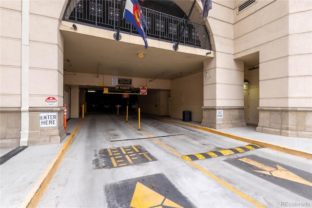 parking garage featuring visible vents